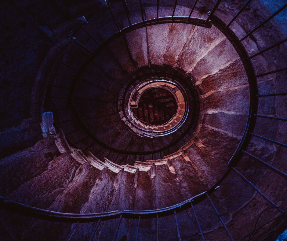 A Self-Sufficient Journey. Image of the top-view of a spiral stair case.
